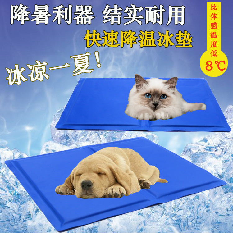 Cat and golden retriever lying on a blue self-cooling mat